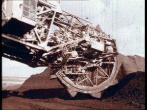 A bucket wheel excavator is operating in the rhenish lignite mining area
